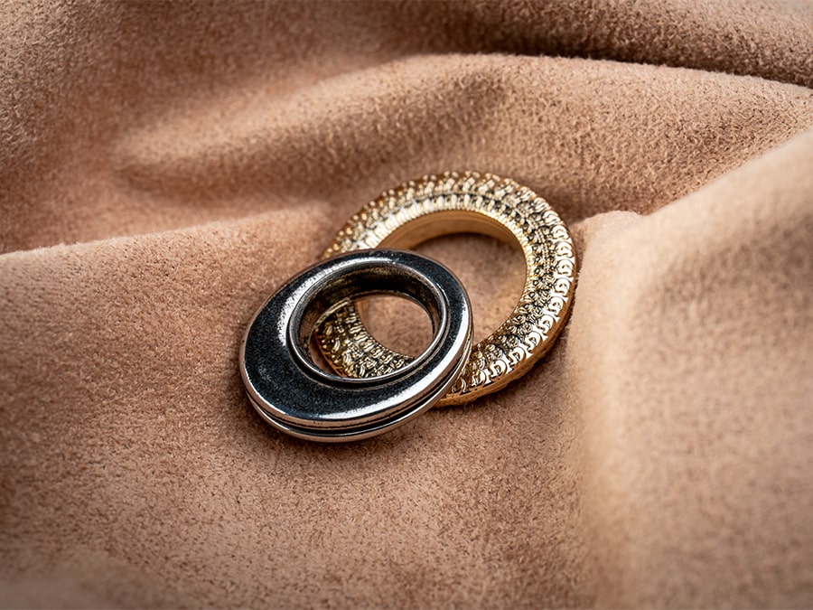Occhielli in metallo color oro e argento per abbigliamento